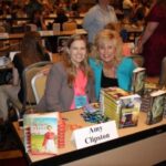 Author Debra Clopton and author Amy Clipson at the 2013 RWA Literacy Signing.