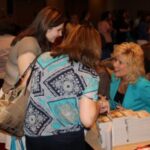 Debra Clopton and readers at RWA 2013 Debra loves visiting with people who enjoy her stories!